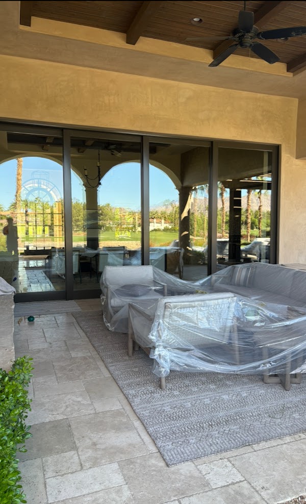 Covered patio and clean glass doors after service